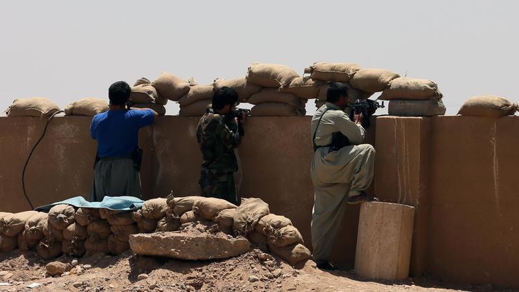 Combattants kurdes au front dans le village de Sulaiman Bek, le 26 juin 2014 [Karim Sahib / AFP/Archives]