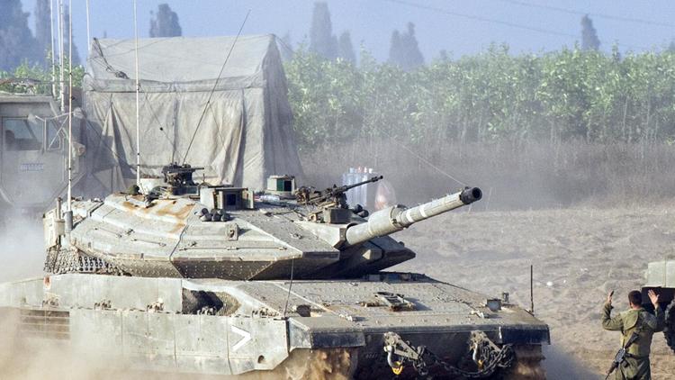Des chars israéliens le 8 juillet 2014 à la frontière de la Bande de Gaza  [Jack Guez / AFP]