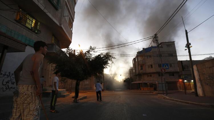 Raid aérien israélien le 13 juillet 2014 au dessus de la ville de Gaza  [Mohammed Abed / AFP]