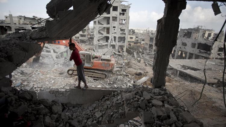 Un immeuble détruit dans le quartier al-Tufah de la bande de Gaza, le 6 août 2014 [Mahmud  Hams / AFP/Archives]