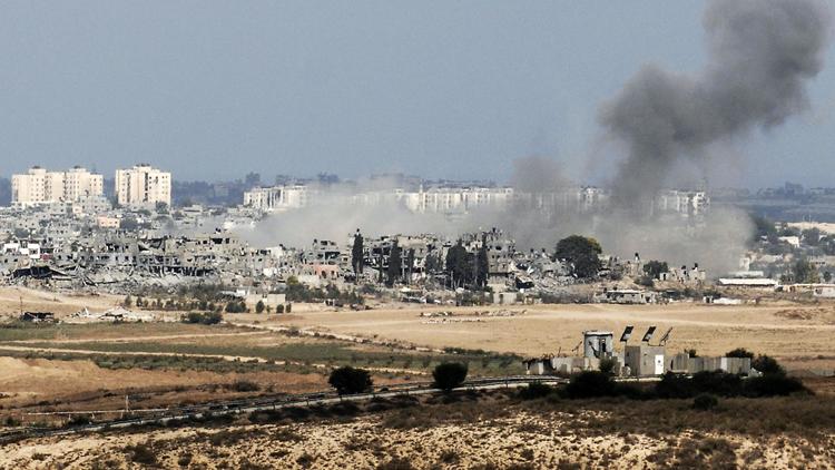 Fumée sur Gaza après une frappe israélienne dimanche 10 aout 2014 [David Buimovitch / AFP]