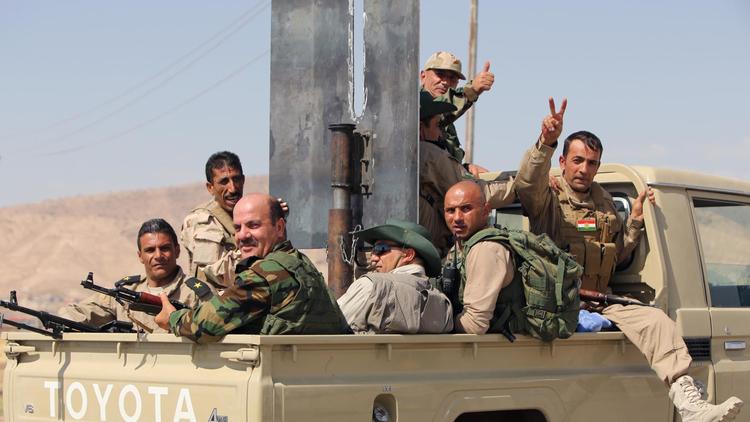 Des combattants peshmerga font route vers Mossoul le 17 août 2014 [Ahamad al-Rubaye / AFP]