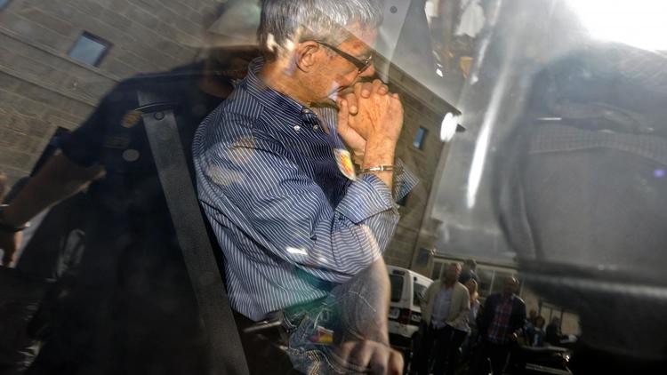 Le chauffeur du train, Jose Garzon Amo, lors de son transfert au palais de justice le 28 juillet 2013 à Saint-Jacques de Compostelle [Rafa Rivas / AFP]