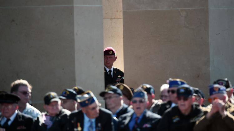 Des vétérans assistent aux cérémonies de commémoration du Débarquement à Colleville-sur-mer, en Normandie, le 6 juin 2014 [Damien Meyer / AFP]