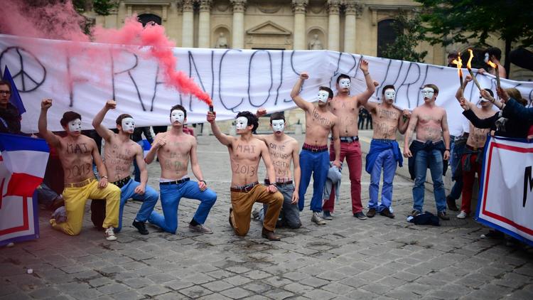 Des militants Hommen manifestent à Paris le 16 mai 2013 [Martin Bureau / AFP/Archives]