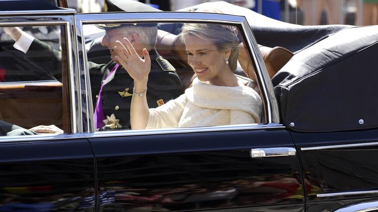 Le roi Philippe et la reine Paola, le 21 juillet 2013 à Bruxelles [Nicolas Maeterlinck / Belga/AFP]
