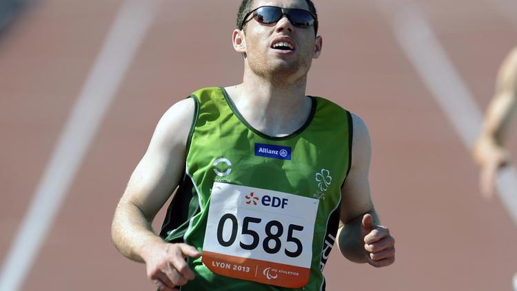 L'Irlandais Jason Smith à l'arrivée du 200 m T13 des Mondiaux handisport le 21 juillet 2013 à Lyon [PHILIPPE MERLE / AFP Photo/Archives]