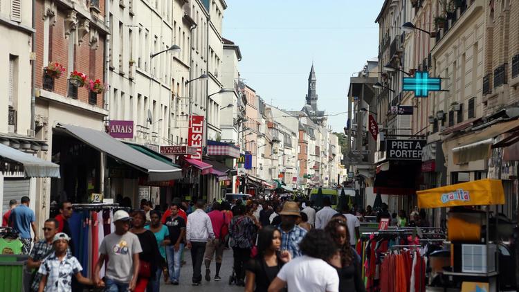 Une rue de Saint-Denis, dans la banlieue parisienne [Thomas Samson / AFP/Archives]