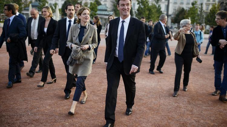 Le candidat UMP à Lyon, Michel Havard (c) au côté de la candidate UMP à la mairie de Paris, Nathalie Kosciusko-Morizet, à Lyon le 18 octobre 2013 [ / AFP]