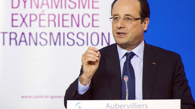 François Hollande, le 28 novembre 2013 à Aubervilliers [Etienne Laurent / Pool/AFP]