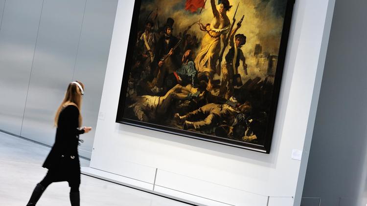 La liberté guidant le peuple, tableau d'Eugène Delacroix exposé au Louvre-Lens, photographiée le 3 décembre 2013 [Philippe Huguen / AFP/Archives]