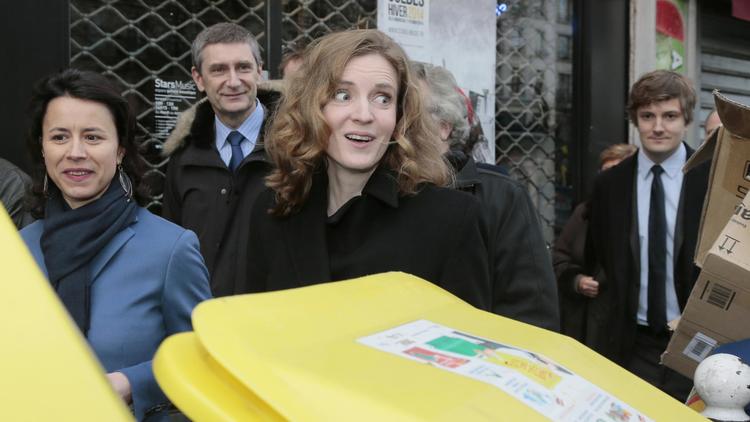 Nathalie Kosciusko-Morizet en campagne le 23 janvier 2014 dans le 9e arrondissement à Paris  entourée de Delphine Burkli (G) et Frederic Pechenard (second plan) [Jacques Demarthon / AFP/Archives]