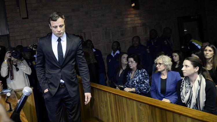 Oscar Pistorius le 19 août 2013 au tribunal à Pretoria [Stéphane de Sakutin / AFP]