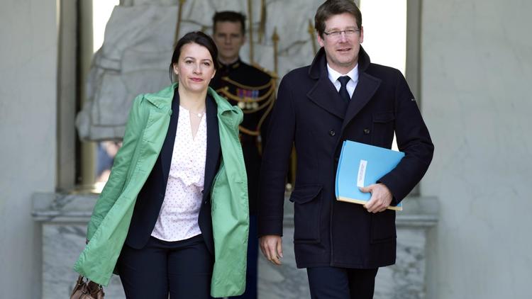La ministre du logement Cécile Duflot et le ministre du développement Pascal Canfin le 26 mars 2014 [Alain Jocard / AFP/Archives]