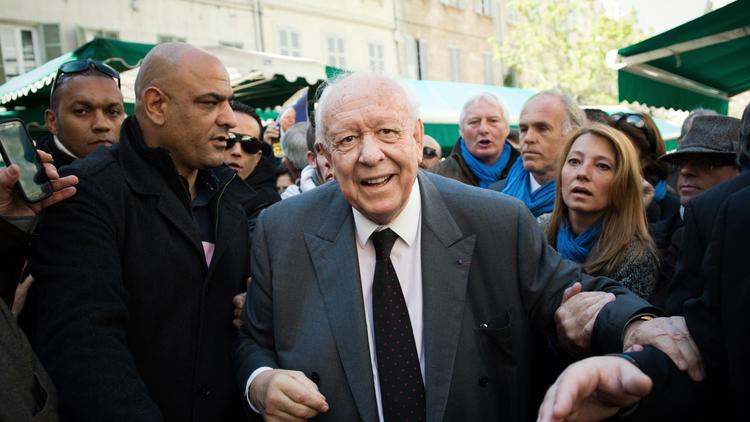 -Le maire sortant Jean-Claude Gaudin lors d'une visite le 28 mars 2014 dans le quartier de Noailles à Marseille  [Bertrang Langlois  / AFP/Archives]