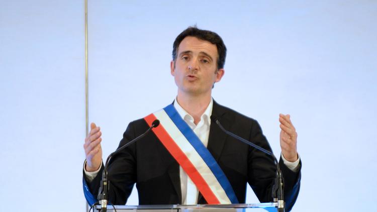 Eric Piolle (EELV) tout juste élu maire de Grenoble, lors du conseil municipal du 4 avril 2014 [Jean-Pierre Clatot / AFP]