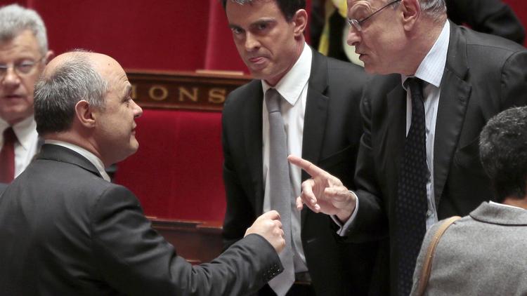 Manuel Valls entre Bruno Le Roux et Jean-Marie Le Guen le 16 avril 2014 à l'Assemblée nationale à Paris  [Jacques Demarthon / AFP]