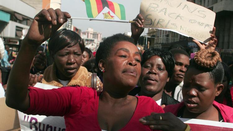 Manifestation pour la libération des lycéennes nigerianes kidnappées, le 22 mai à Harare [Jekesai Nijikizana / AFP]