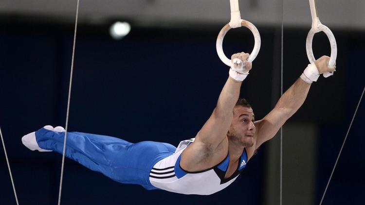 Le Français Samir Samir Aït-Saïd en action, le 22 mai 2014 aux Championnats d'Europe de gymnastique artistique, à Sofia [Nikolay Doychinov / AFP/Archives]