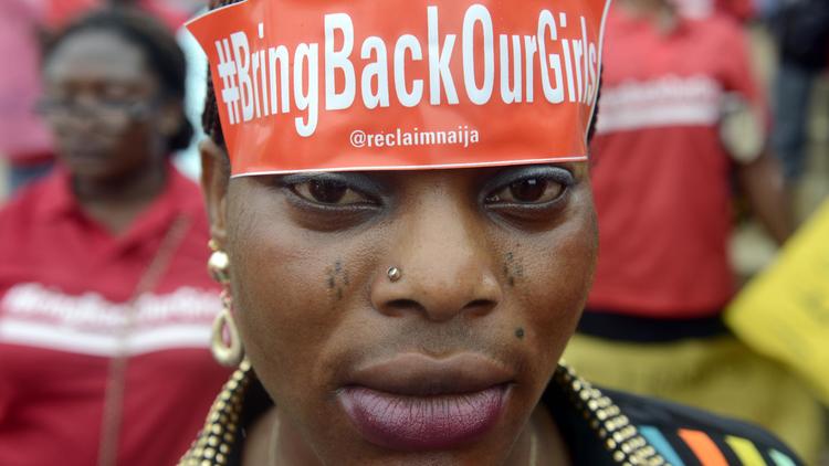 Une femme participe à une manifestation de soutien aux lycéennes enlevées par Boko Haram, le 29 mai 2014 à Lagos [Pius Utomi Ekpei / AFP/Archives]