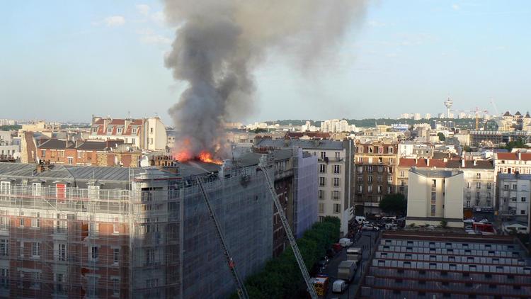 Incendie d'un immeuble le 7 juin 2014 à Aubervilliers [Joel Estienne / AFP]