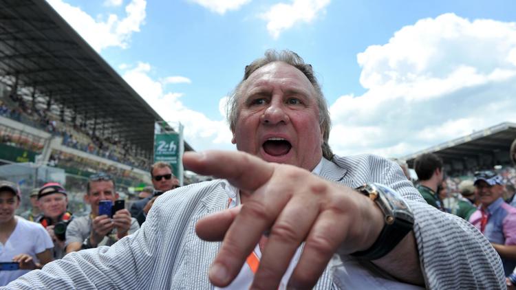 Gérard Depardieu aux 24 heures du Mans, le 14 juin 2014 [Guillaume Souvant / AFP/Archives]