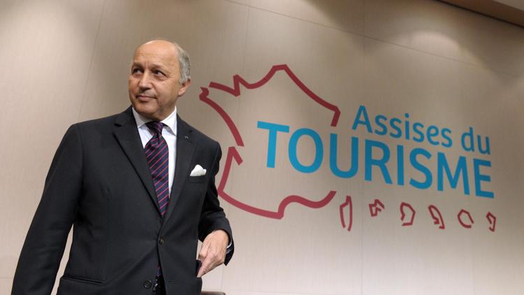 Le chef de la diplomatie française Laurent Fabius aux Assises du tourisme le 19 juin 2014 à Paris [Eric Piermont / AFP/Archives]
