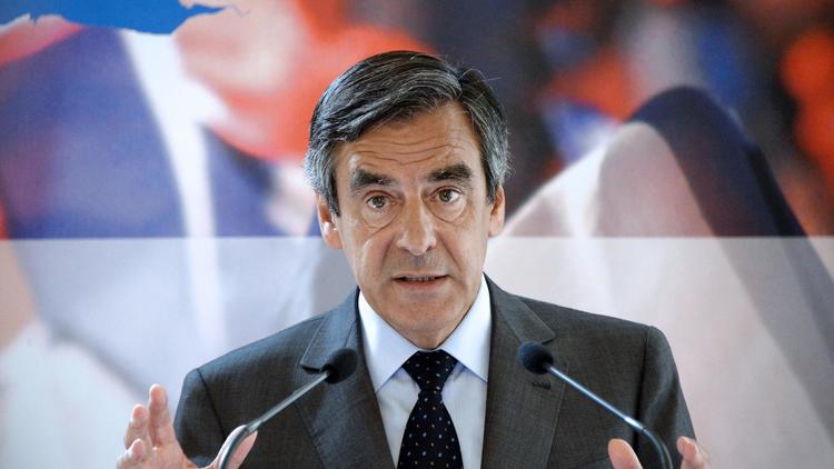 François Fillon, ancien Premier ministre et membre du triumvirat qui gère provisoirement l'UMP, lors d'une conférence de presse sur la compétitivité, le 25 juin 2014 à Paris [Bertrand Guay  / AFP/Archives]