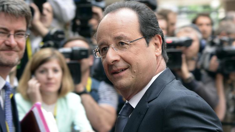 François Hollande arrivant au siège de la Commission européenne à Bruxelles le 27 juin 2014 pour le sommet qui débouche sur la désignation d'un nouveau président de la Commission  [Thierry Charlier / AFP]