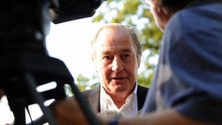Le président de Lens, Gervais Martel, parle à la presse, le 26 juillet 2014 au Touquet [François Lo Presti / AFP/Archives]