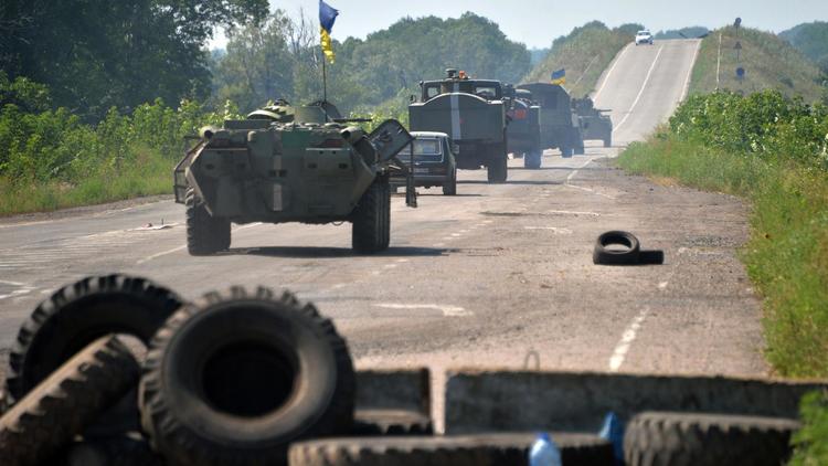 L'armée ukrainienne patrouille près de Debaltseve, dans la région de Lougansk, le 1er août 2014 [Genya Savoliv / AFP]