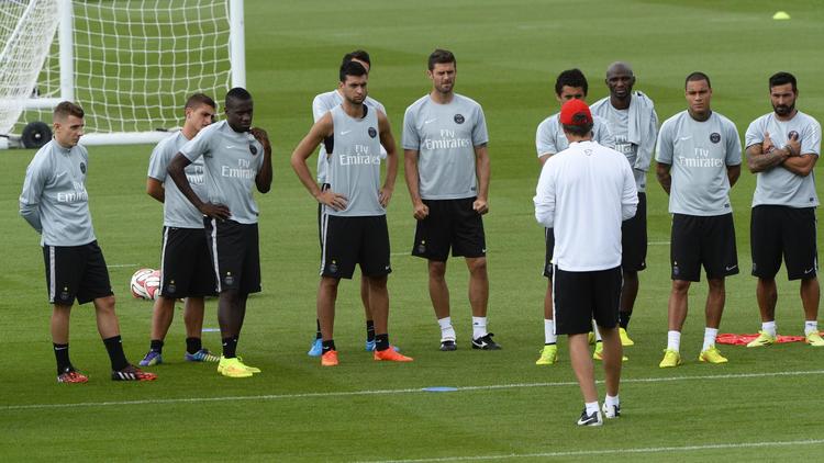 Les joueurs du PSG à l'entraînement, avec leur entraîneur Laurent Blanc, au Camp des Loges, à Saint-Germain-en-Laye, le 7 août 2014 [Bertrand Guay / AFP]