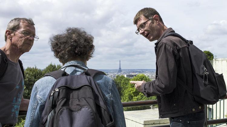 Vincent, sans-domicile fixe, guide des touristes dans le XXe arrondissement de Paris, le 9 août 2014 [Fred Dufour / AFP]