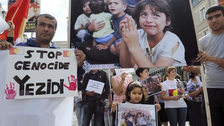 Une manifestation de soutien aux Yazidis, minorité kurdophone non musulmane persécutée par l'Etat islamique (EI), le 20 août 2014 à Angers [Jean-François Monier / AFP]