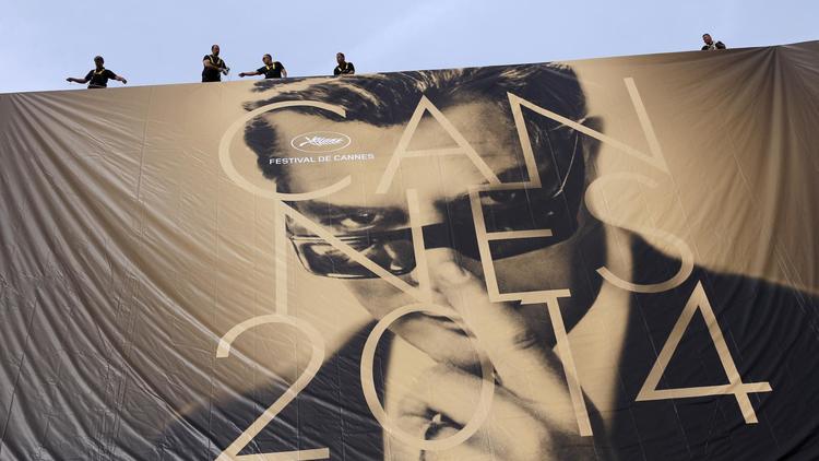 L'Affiche du 67e festival de Cannes, qui ouvre ses portes mercredi 14 mai 2014, avec une photo de l'acteur italien Marcello Mastroianni [Valery Hache / AFP/Archives]
