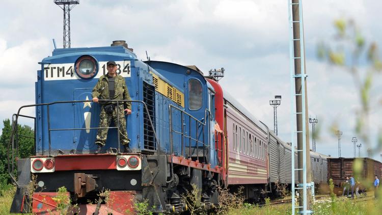 Le train transportant les corps des victimes du crash du vol MH17 à Kharkiv en Ukraine, le 22 juillet 2014 [Sergey Bobok / AFP]