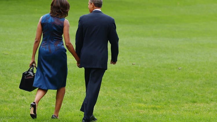 Barack Obama et son épouse Michelle, le 23 septembre 2013 à Washington DC [Mandel Ngan / AFP]