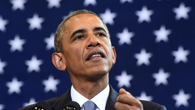 Barack Obama lors d'une courte allocution à la Maison Blanche, le 21 juillet 2014 [Jewel Samad / AFP]