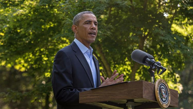 Le président américain Barack Obama donne une conférence de presse sur l'intervention en Irak le 11 août 2014 à Martha's Vineyard [Nicholas Kamm / AFP]
