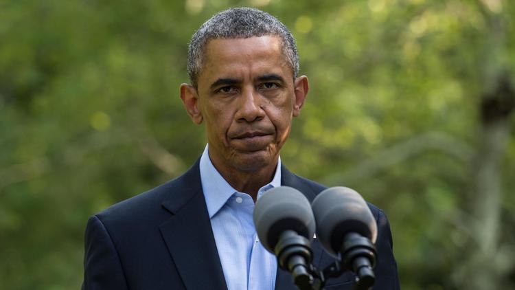 Le président américain Barack Obama dans le Massachusetts le 11 août 2014 [Nicholas Kamm / AFP]