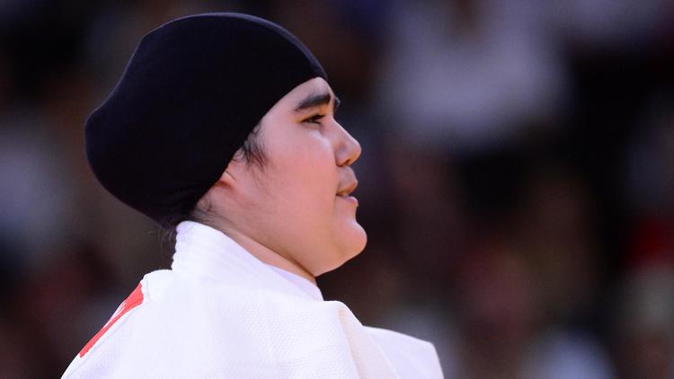 Les jeux Olympiques de Londres ont connu un moment symbolique fort vendredi matin, avec la première apparition en compétition d'une femme saoudienne, la tête couverte, en judo[AFP]