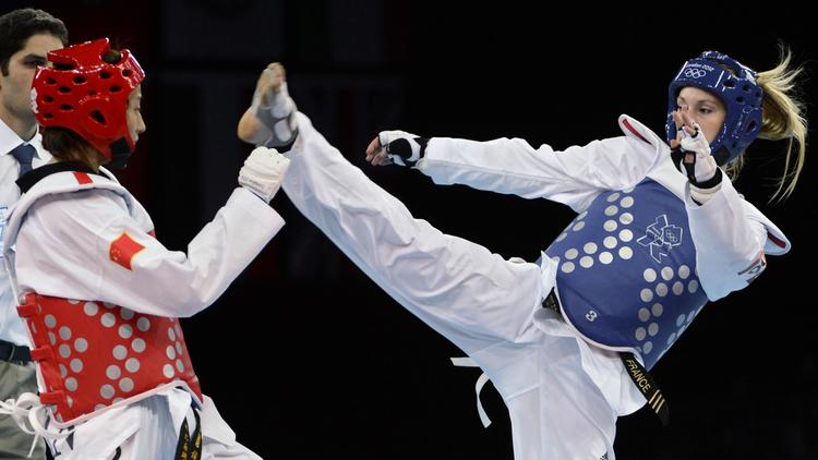La Française Marlène Harnois a décroché la médaille de bronze pour sa première participation aux jeux Olympiques, en battant dans le combat pour la 3e place du tournoi de taekwondo des moins de 57 kg la Japonaise Mayu Hamada (12-8), jeudi à Londres.[AFP]