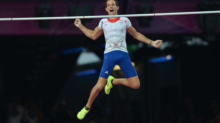 Le Français Renaud Lavillenie a remporté la médaille d'or du saut à la perche des jeux Olympiques de Londres avec un saut à 5,97 m, devançant les Allemands Bjorn Otto (5,91 m) et Raphael Holzdeppe (5,91 m), en argent et en bronze, vendredi soir.[AFP]