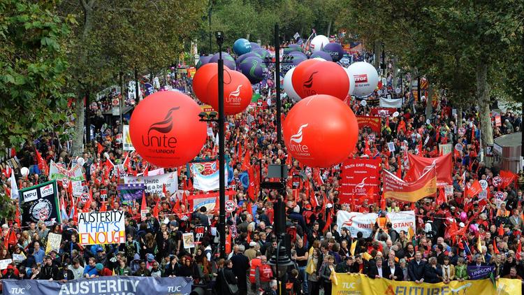 Manifestation contre la politique d'austérité du gouvernement britannique, le 20 octobre 212 à Londres [Carl Court / AFP]