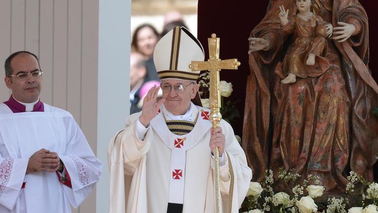 Le pape François lors de sa messe d'inauguration le 19 mars 2013 place Saint-Pierre au Vatican [Filippo Monteforte / AFP]