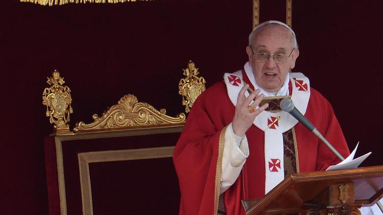 Le pape François lors de la célébration du Dimanche des Rameaux, place Saint-Pierre au Vatican, le 24 mars 2013 [Filippo Monteforte / AFP]