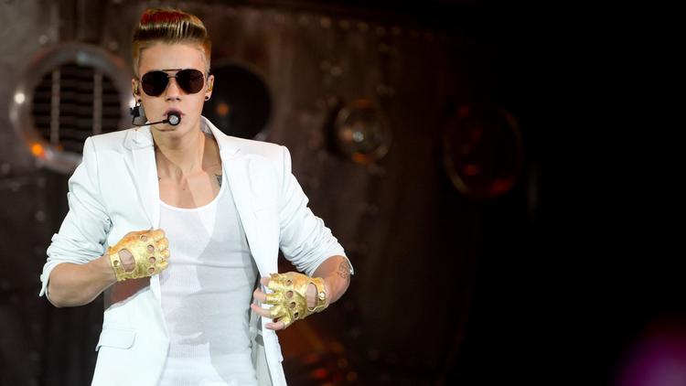 Le chanteur Justin Bieber en concert à Hambourg le 2 avril 2013 [Sven Hoppe / DPA/AFP]