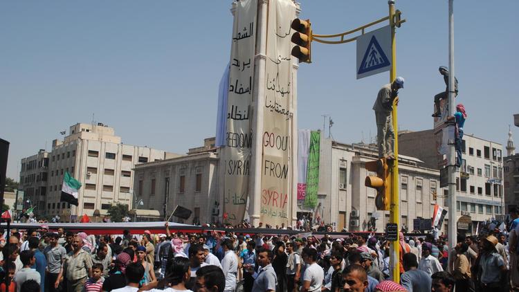 Manifestation d'opposants au régime dans la ville de Hama, dans le centre de la Syrie, le 22 juillet 2011 [ / AFP/Archives]