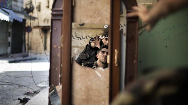 Des soldats de l'Armée syrienne libre (ASL) à Alep, le 16 septembre 2012 [Marco Longari / AFP/Archives]