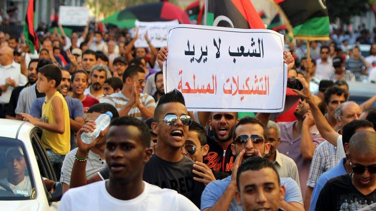 Des Libyens manifestent à Benghazi contre les milices armées, le 21 septembre 2012 [Abdullah Doma / AFP]
